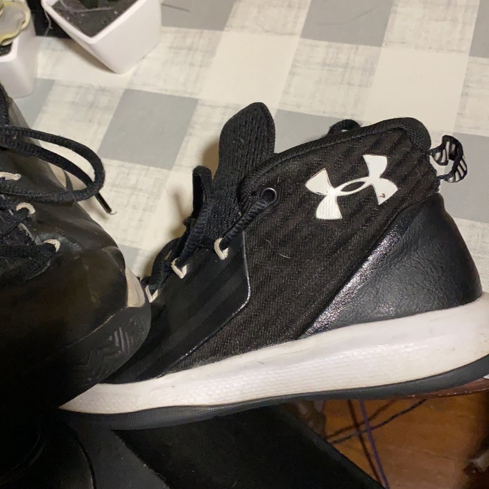 Black Under Armour mid top shoes size 2